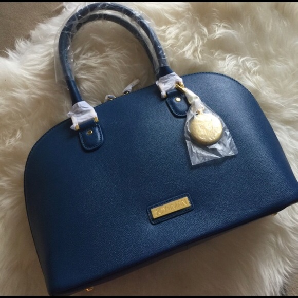 joy iman purse